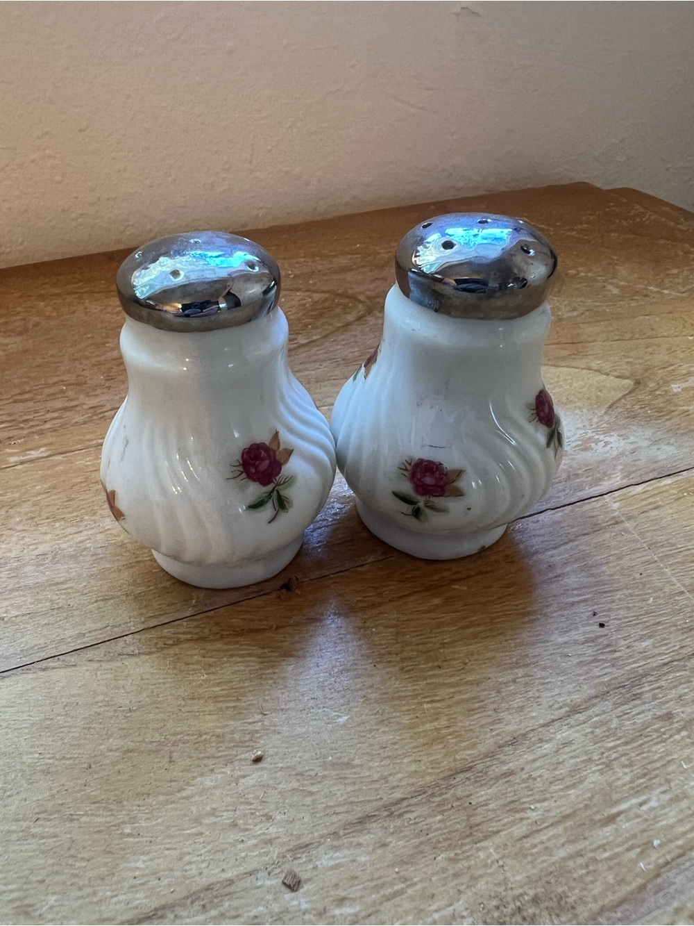 Decorative White Ceramic Salt and Pepper Shakers with Rose Motif